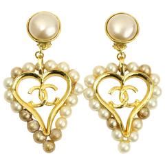 vintage chanel heart pearl earrings|Vintage Chanel cc earrings price.